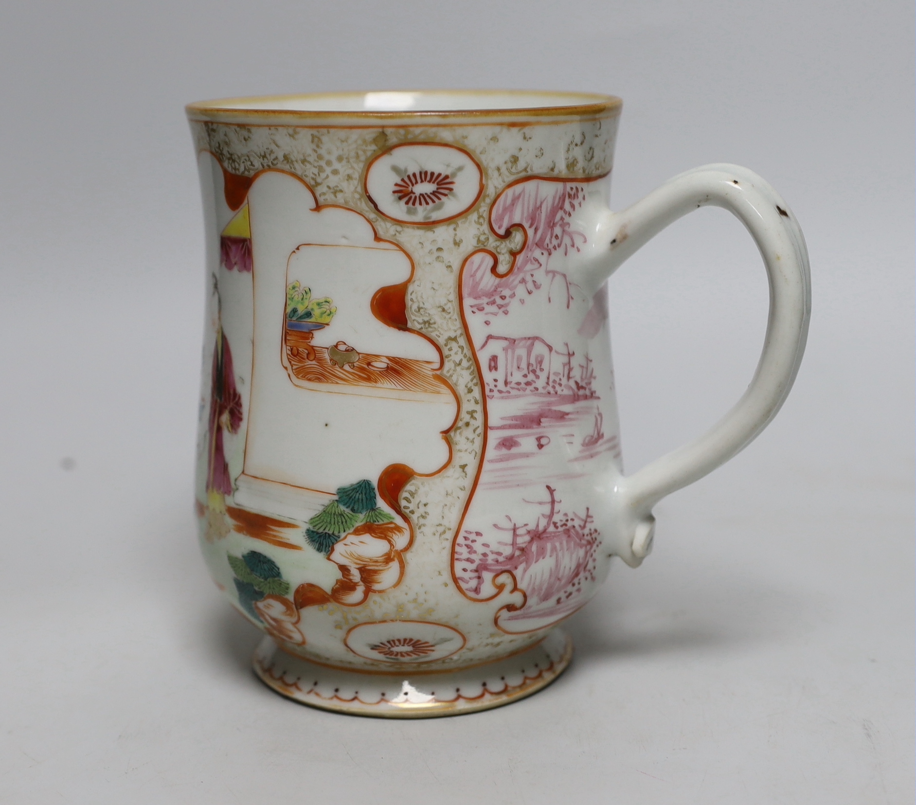 An 18th century Chinese export famille rose mug, 15.5cm high